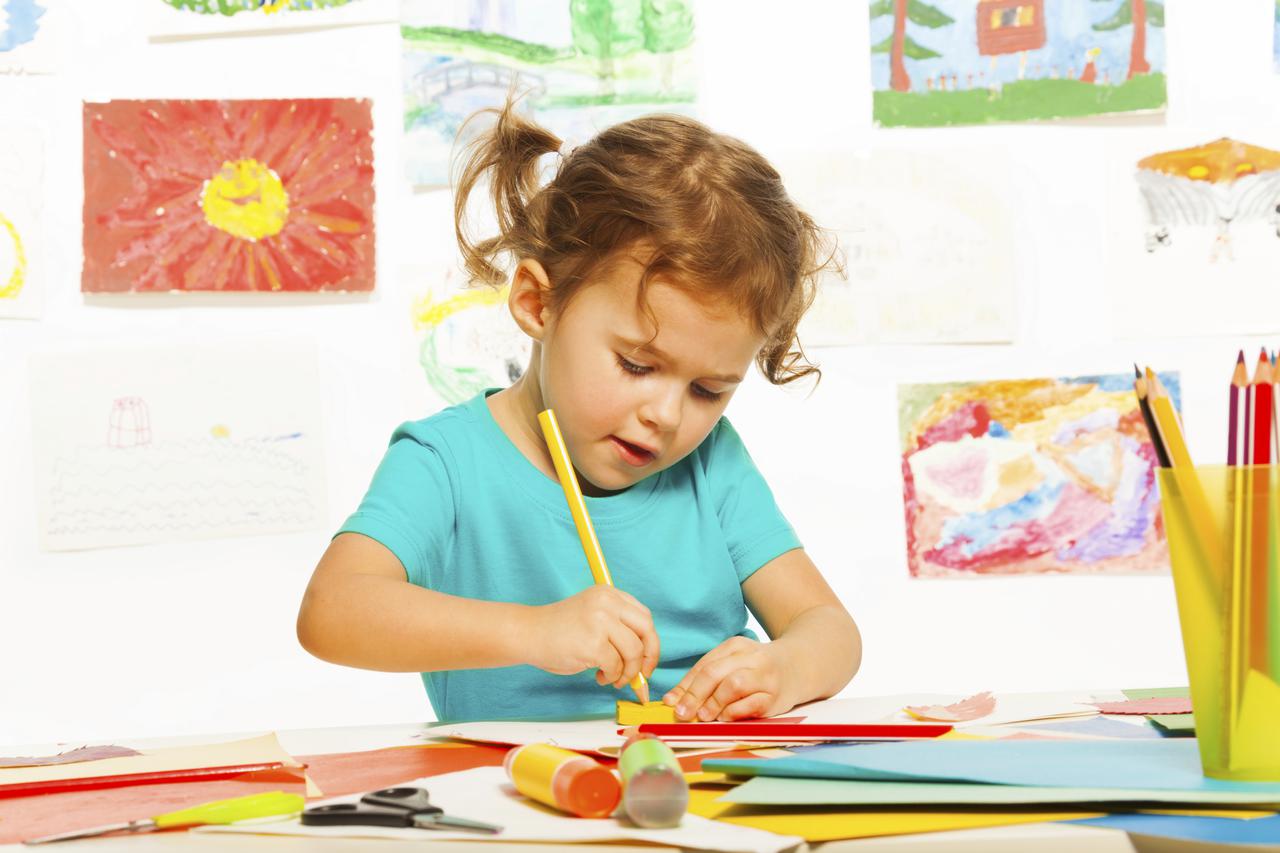 Little girl sketching