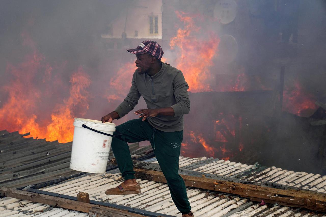 Shack fire in Masiphumelele shack settlement in Cape Town, South Africa