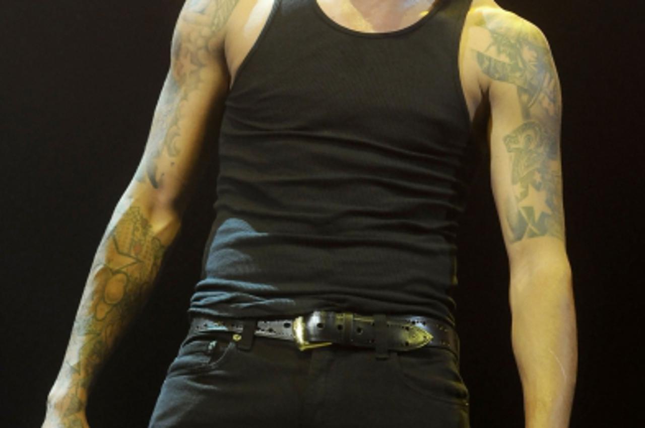 'Rapper Chris Brown performs onstage during Power 105.1\'s Powerhouse concert at the IZOD Center, Meadowlands. Photo: Press Association/Pixsell'