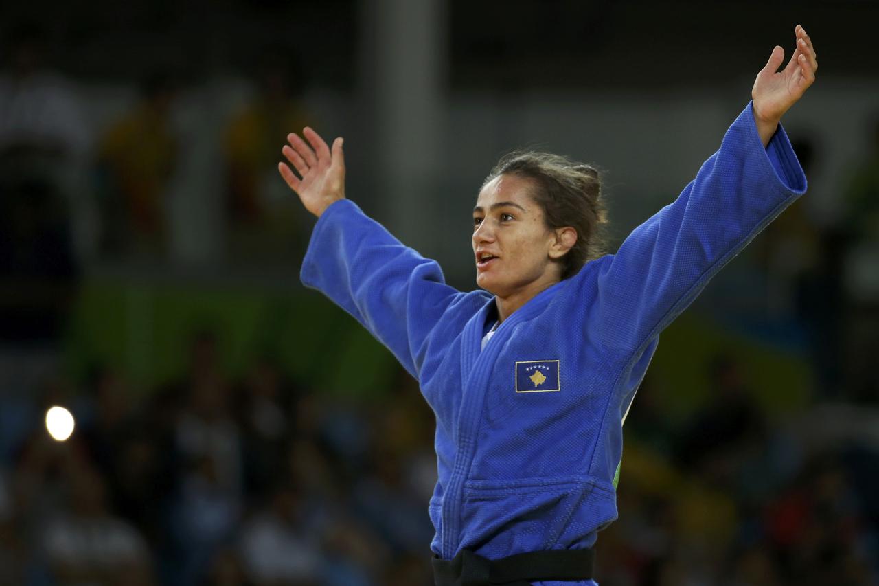 2016 Rio Olympics - Judo - Final - Women -52 kg Final - Gold Medal Contest - Carioca Arena 2 - Rio de Janeiro, Brazil - 07/08/2016. Majlinda Kelmendi (KOS) of Kosovo celebrates. REUTERS/Toru Hanai TPX IMAGES OF THE DAY. FOR EDITORIAL USE ONLY. NOT FOR SAL