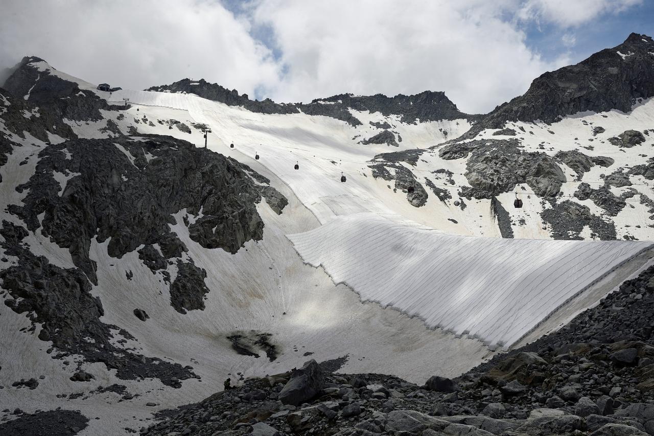 FILE PHOTO: Large white geotextile sheets are seen covering northern Italy's Presena glacier
