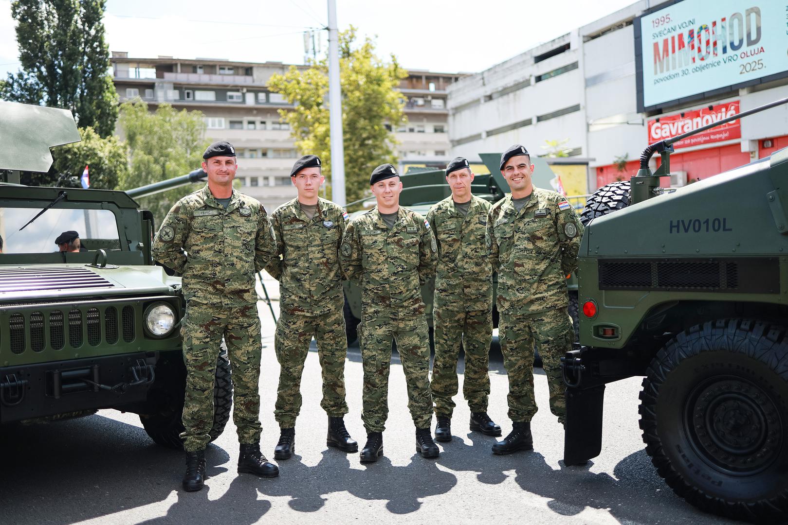 31.07.2025., Zagreb - Izlazak vozila mehaniziranog i motoriziranog postroja mimohoda iz vojarne "1. gardijske brigade Tigrovi - Croatia". Vojnici poziraju za fotografiranje. Photo: Mia Slafhauser/PIXSELL