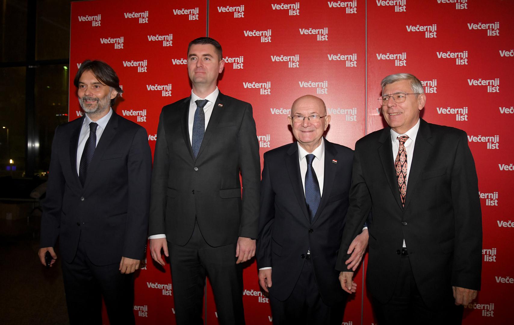 16.01.2023., Zagreb - U Nacionalnoj i sveucilisnoj knjiznici odrzana je promocija 2. dopunjenog izdanja knjige "Diplomatska oluja" Mate Granica. glavni urednik Vecernjeg lista Drazen Klaric, ministar gospodarstva i odrzivog razvoja Davor Filipovic, Mate Granic, Zeljko Reiner Photo: Josip Regovic/PIXSELL