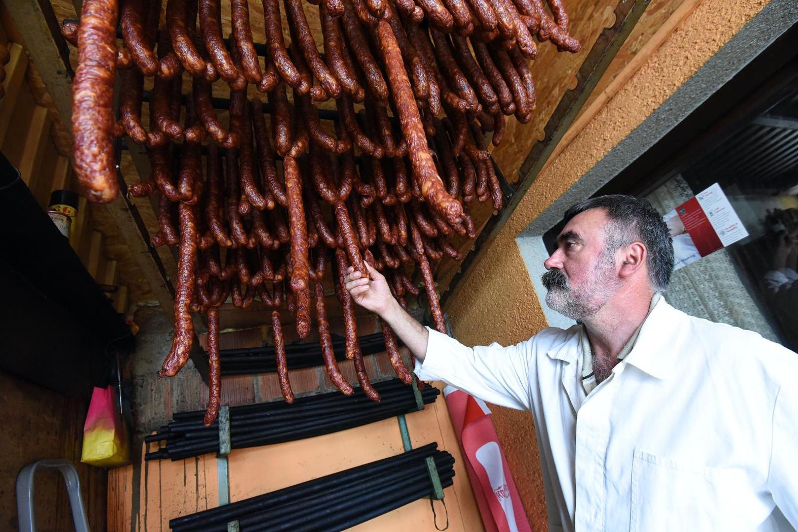 01.07.2016., Slakovec, Nedelisce - OPG Djuran. Darko Djuran provjerava susenje kobasica.
Photo: Vjeran Zganec Rogulja/PIXSELL