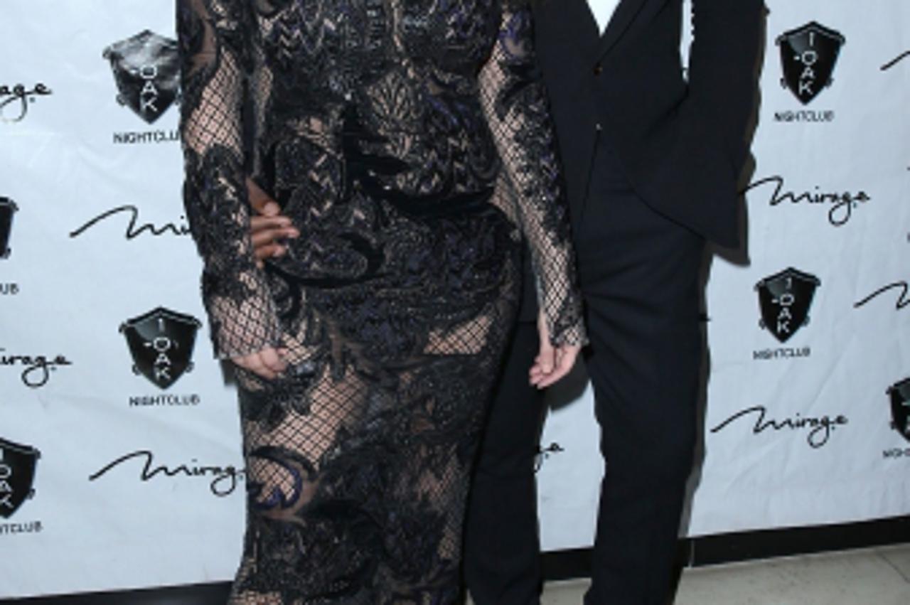 'Kim Kardashian and Kanye West out at 1 Oak Nightclub at The Mirage Resort and Casino Las Vegas  Featuring: Kim Kardashian, Kanye West Where: Las Vegas, NV, United States When: 31 Dec 2012 Credit: Jud