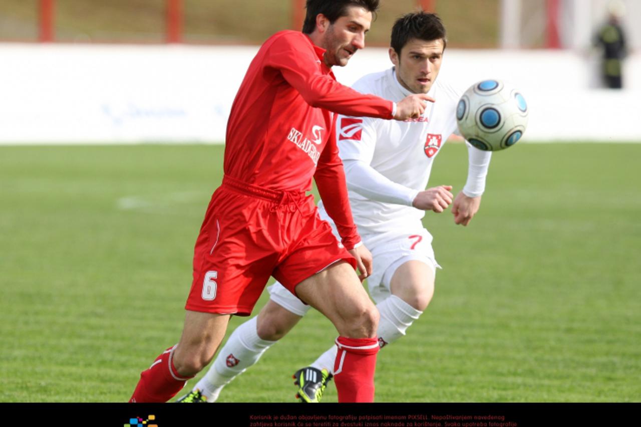 '19.03.2011., Park mladezi, Split - Nogometna utakmica 22. kola Prve HNL izmedju RNK Split i NK Zagreb. Predrag Simic i Josip Jurendic. Photo: Ivo Cagalj/PIXSELL'