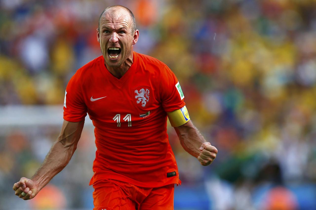Arjen Robben of the Netherlands celebrates after winning their 2014 World Cup round of 16 game against Mexico at the Castelao arena in Fortaleza June 29, 2014.   REUTERS/Eddie Keogh (BRAZIL  - Tags: SOCCER SPORT WORLD CUP TPX IMAGES OF THE DAY)