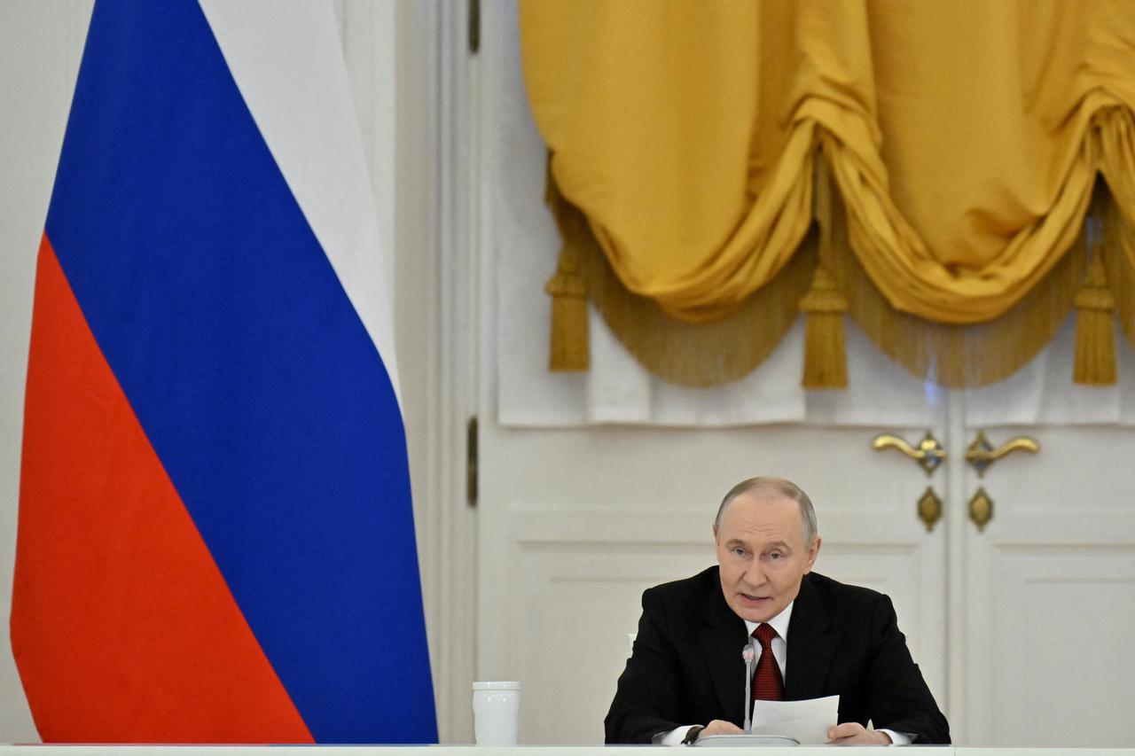 Russian President Vladimir Putin chairs a State Council meeting at the Kremlin in Moscow