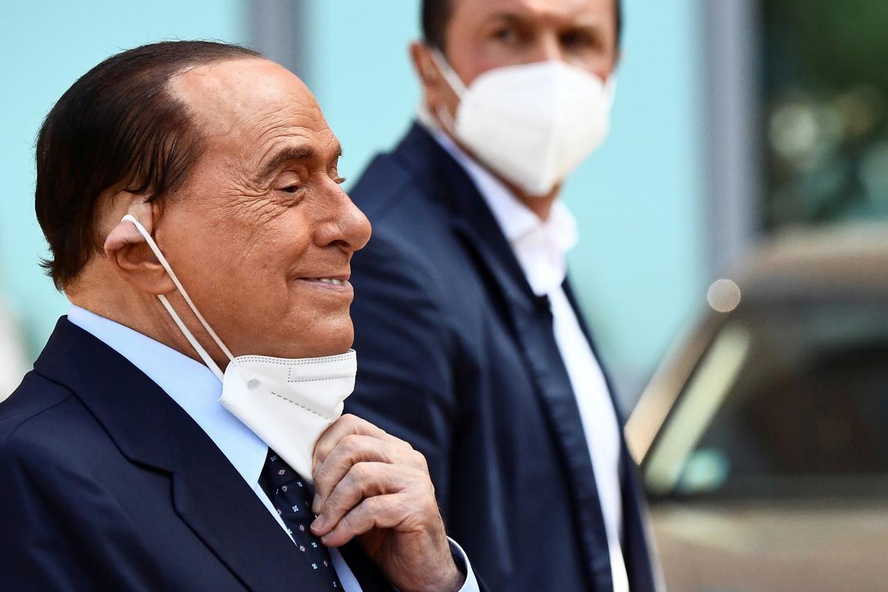 FILE PHOTO: Former Italian Prime Minister Silvio Berlusconi is discharged from Milan's San Raffaele hospital