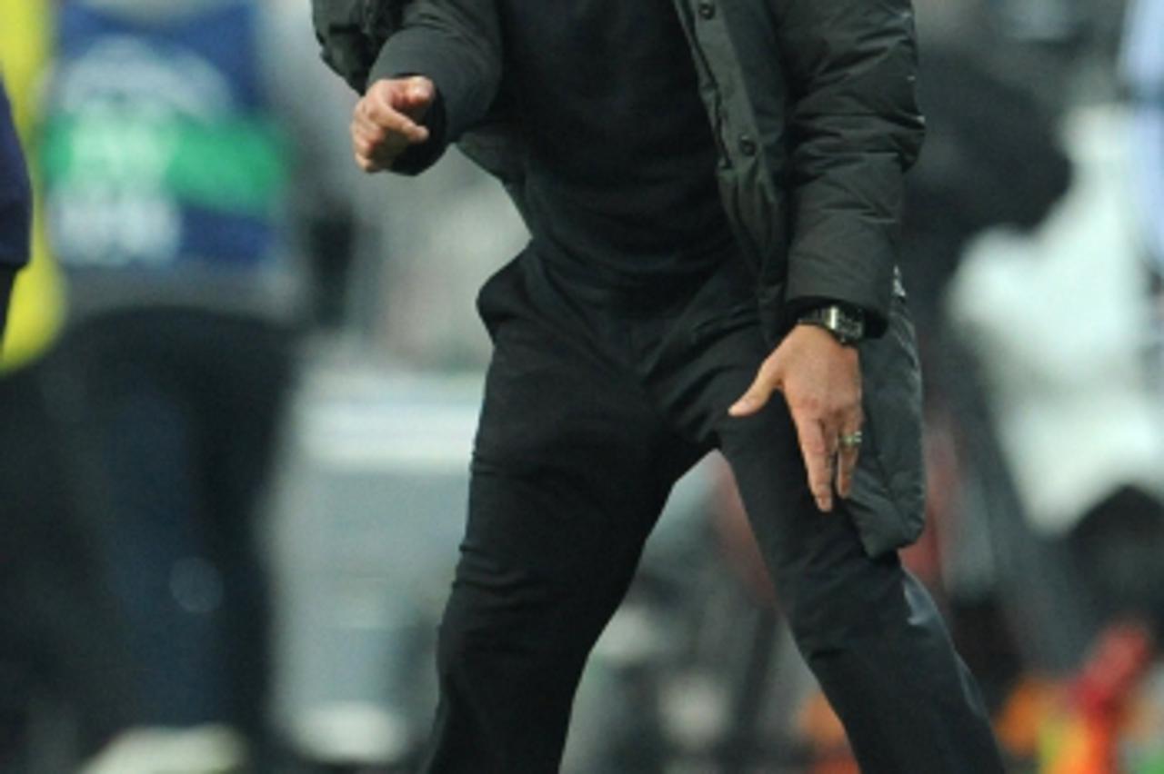 \'Madrid\'s coach Jose Mourinho reacts during the ball during the Champions League semi-final first leg soccer match between FC Bayern Munich and Real Madrid at the Allianz Arena in Munich, Germany, 1