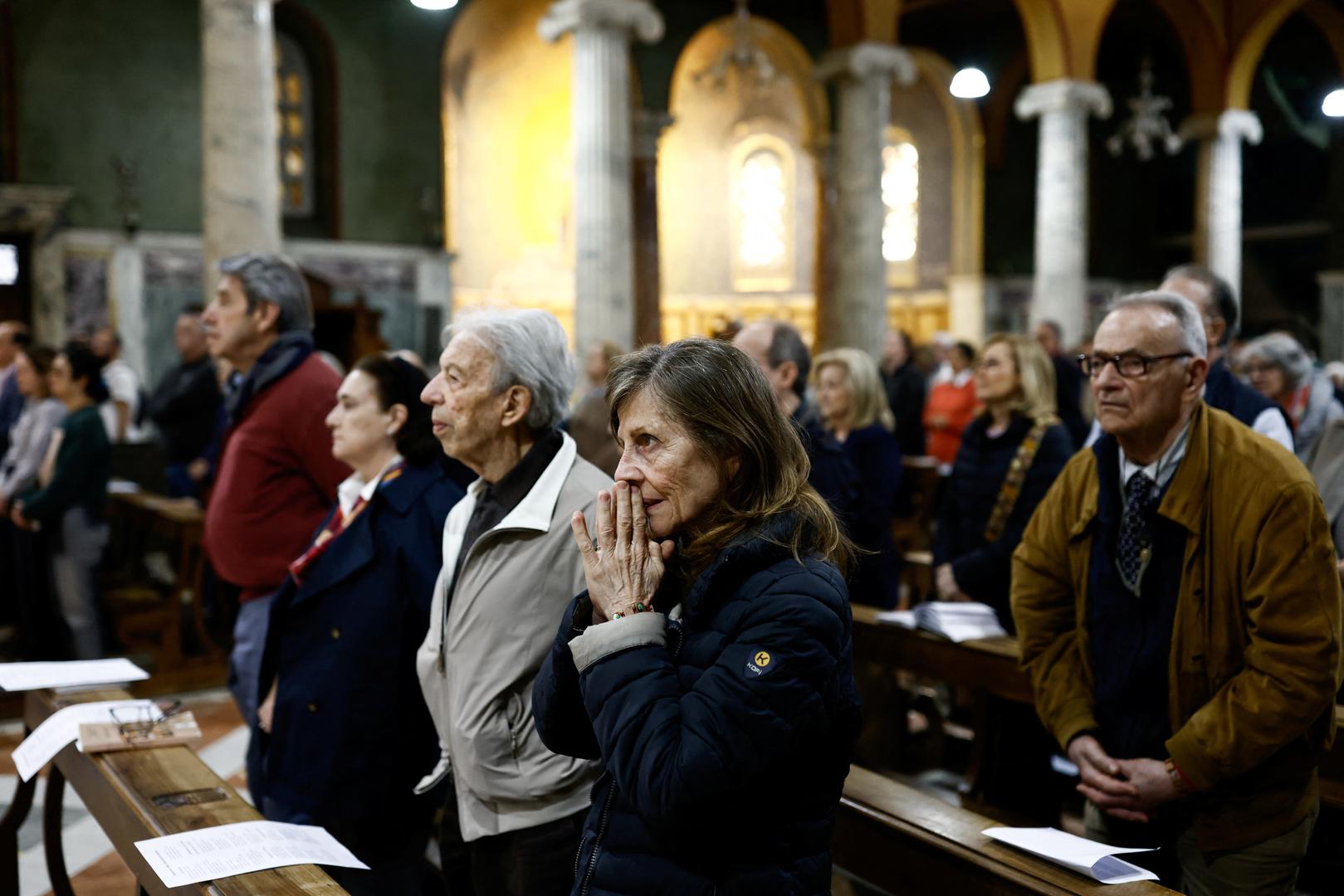 People attend a Holy Mass in memory of Pope Francis at the Church of Santa Maria Addolorata, after the death of the pontiff was announced by the Vatican, in Rome, Italy, April 21, 2025. REUTERS/Matteo Minnella Photo: Matteo Minnella/REUTERS