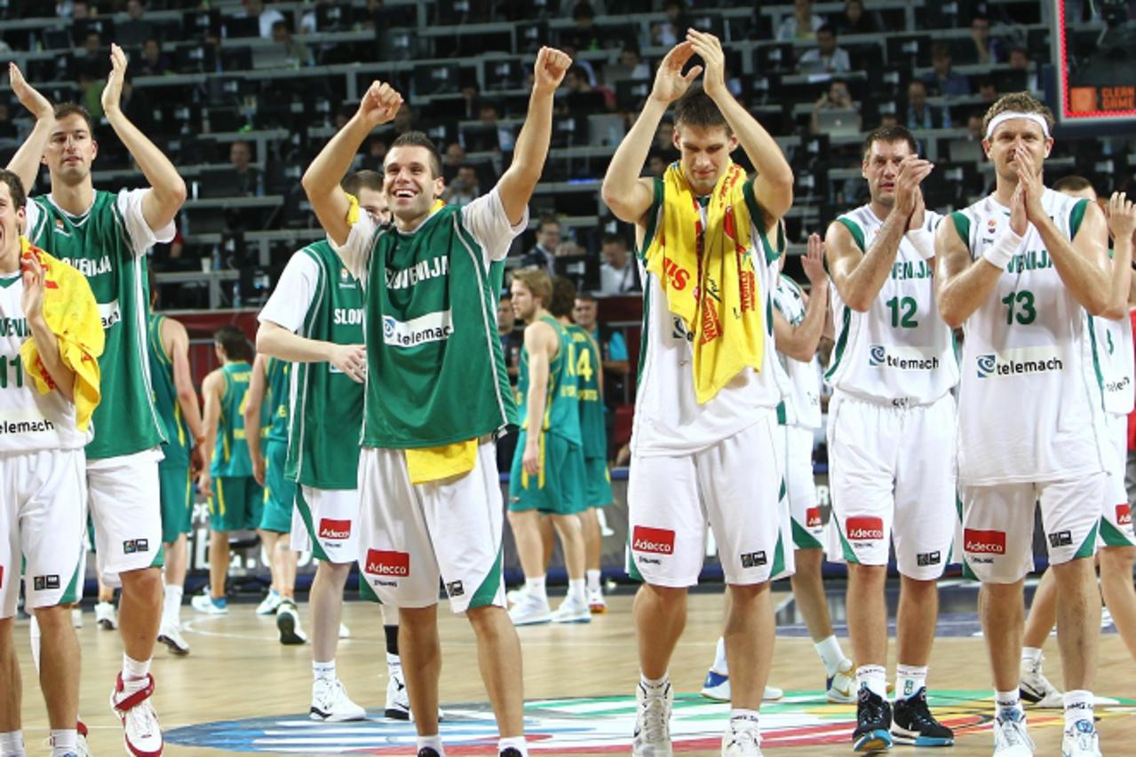 'Slovanian players celebrate at the end of the World Championship eighth of finals basketball match Slovenia vs. Australia, on September 5, 2010 in Istanbul. Slovenia won 87 to 58.            AFP PHOT