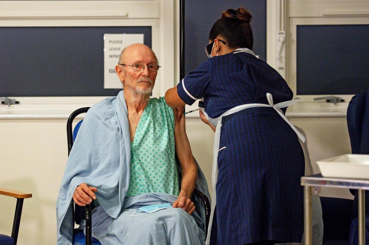 "Bill" William Shakespeare, 81, receives the Pfizer/BioNTech  COVID-19 vaccine at University Hospital in Coventry
