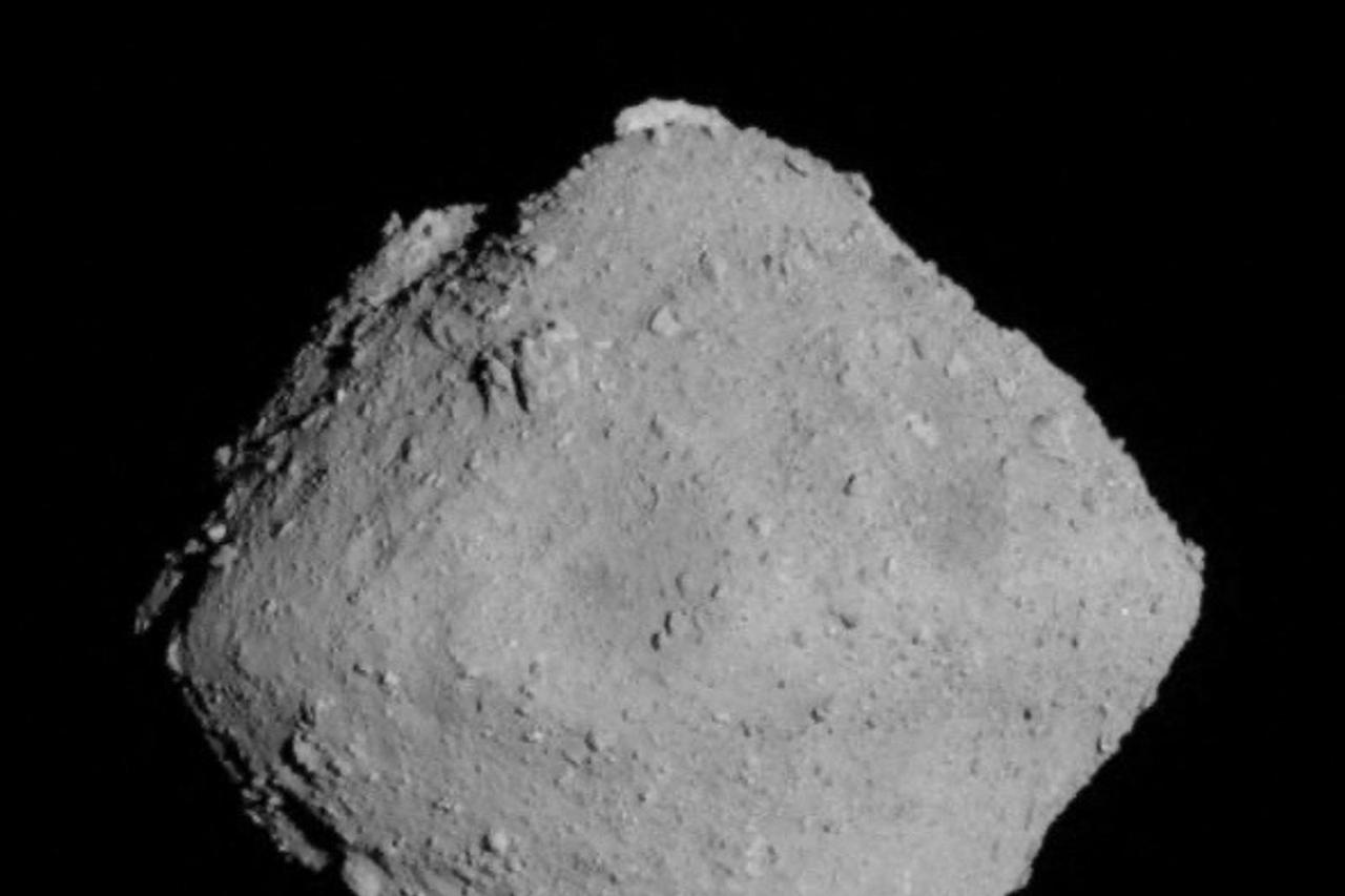 The carbonaceous asteroid Ryugu is seen from a distance of about 12 miles (20 km) during the Japanese Space Agency's Hayabusa2 mission