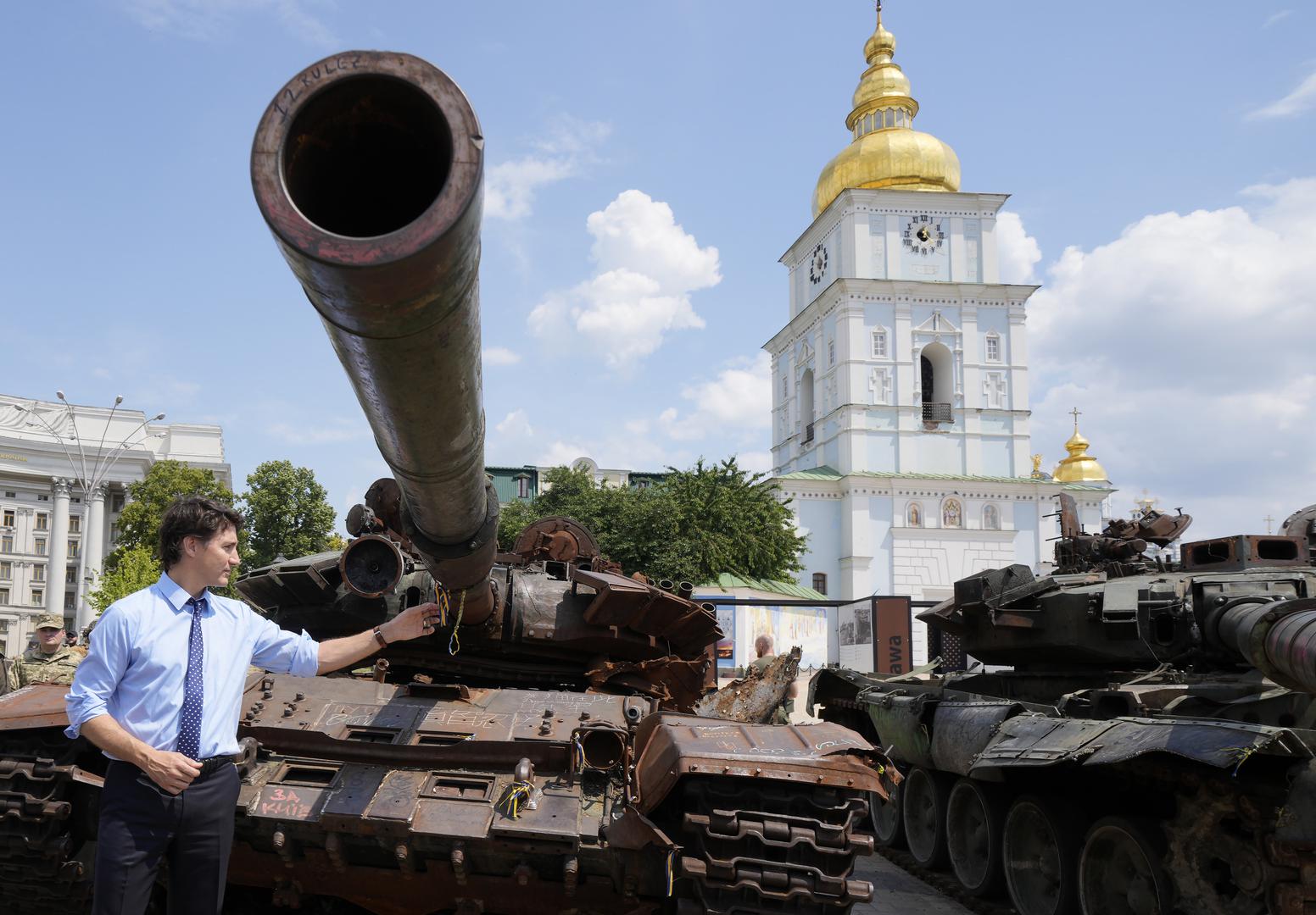 Prime Minister Justin Trudeau checks out a burned out Russian tank in Kyiv, Ukraine, on Saturday, June 10, 2023. THE CANADIAN PRESS/Frank Gunn Photo: Frank Gunn/PRESS ASSOCIATION