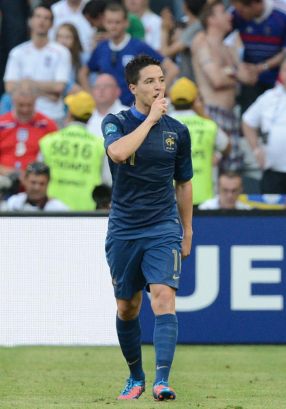 'French midfielder Samir Nasri gestures after scoring a goal during the Euro 2012 championships football match France vs England on June 11, 2012 at the Donbass Arena in Donetsk. AFP PHOTO / PATRICK H