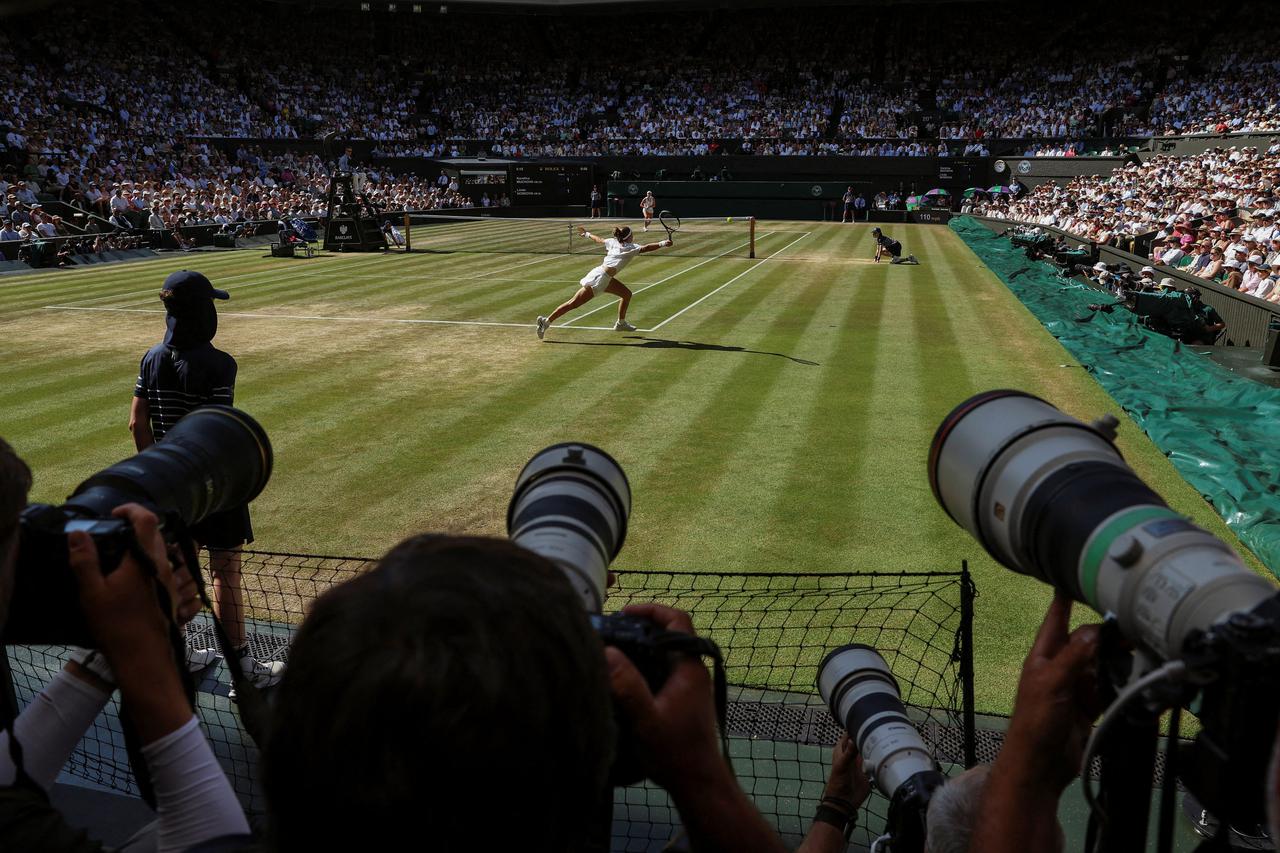 The Wider Image - From the sidelines: Beyond the traditions, glimpses of Wimbledon's fierce sporting soul