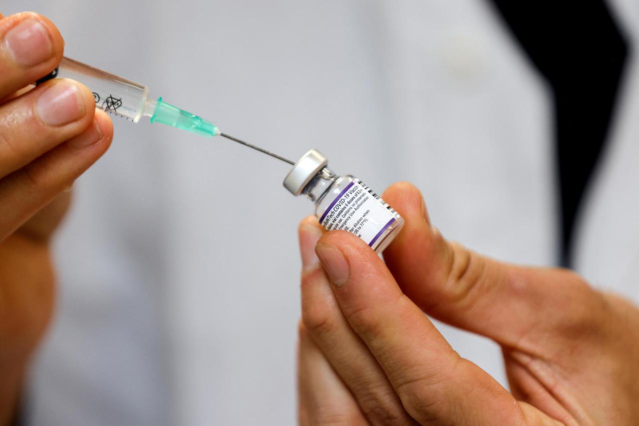 People receive the fourth dose of coronavirus disease (COVID-19) vaccine in Tel Aviv