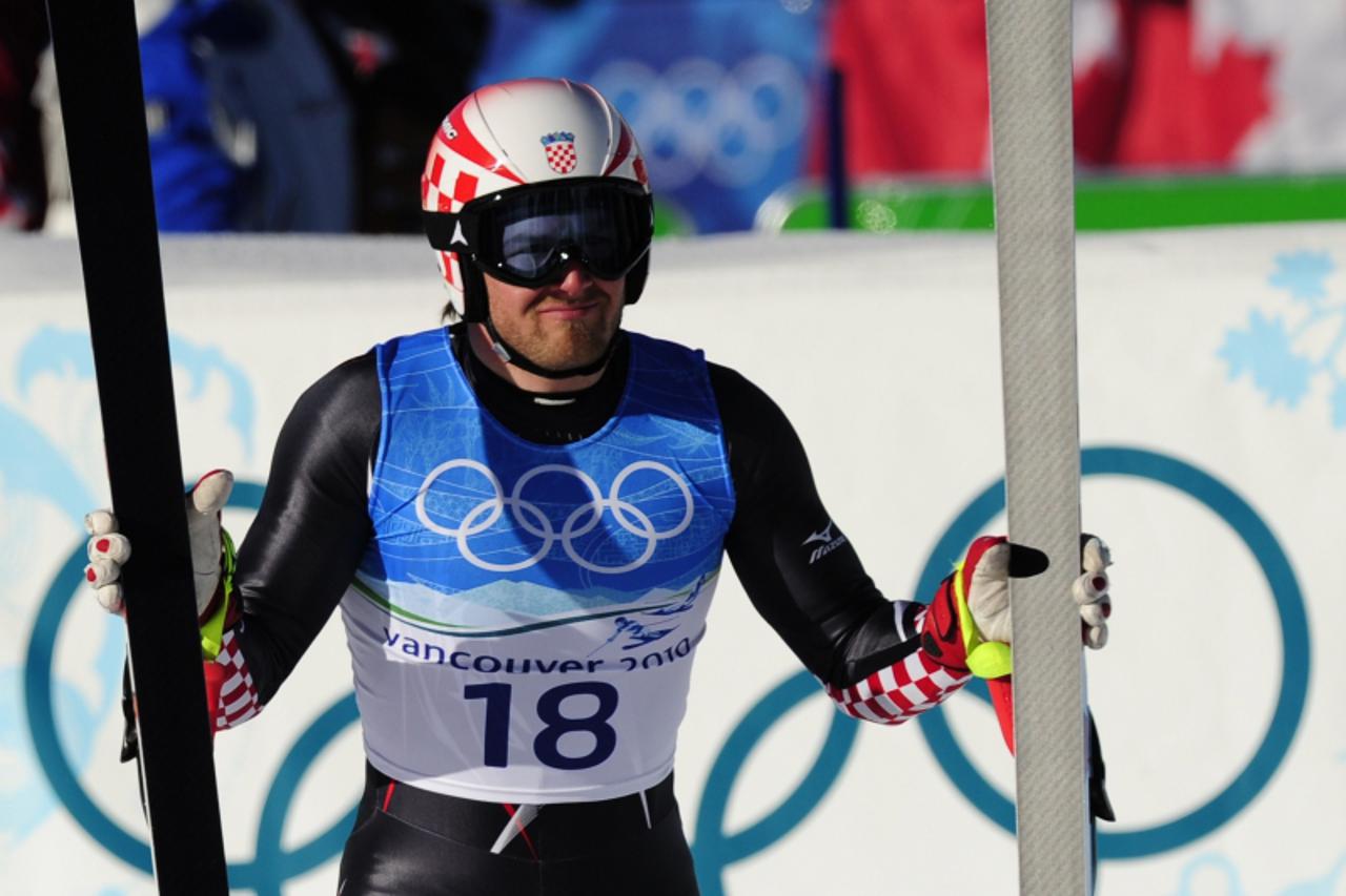 'Croatia\'s Natko Zrncic-Dim reacts in the finish area during the men\'s super-combined downhill race of the Vancouver 2010 Winter Olympics at the Whistler Creek side Alpine skiing venue on February 2