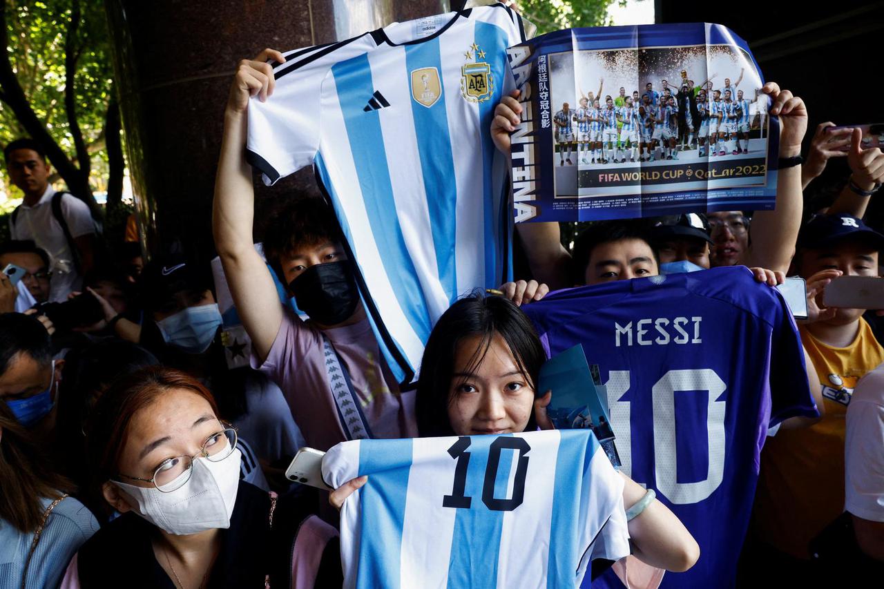 Chinese fans wait for Argentina’s Lionel Messi to arrive at a hotel ahead of International Friendly match between Argentina's and Australia's national football team in Beijing
