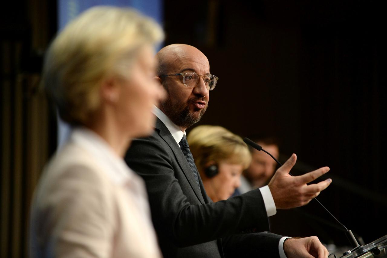 European Commission President von der Leyen, EU Council President Charles Michel and German Chancellor Merkel hold a news conference at the end of a EU leaders summit in Brussels