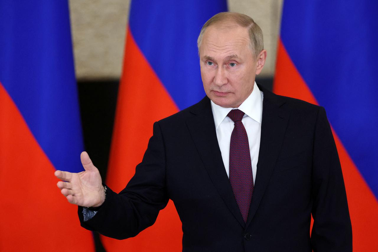 Russian President Putin attends a news conference in Samarkand