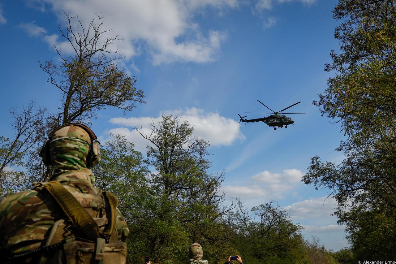 Volunteers of a newly formed battalion take part in a training at a range outside the city of Melitopol