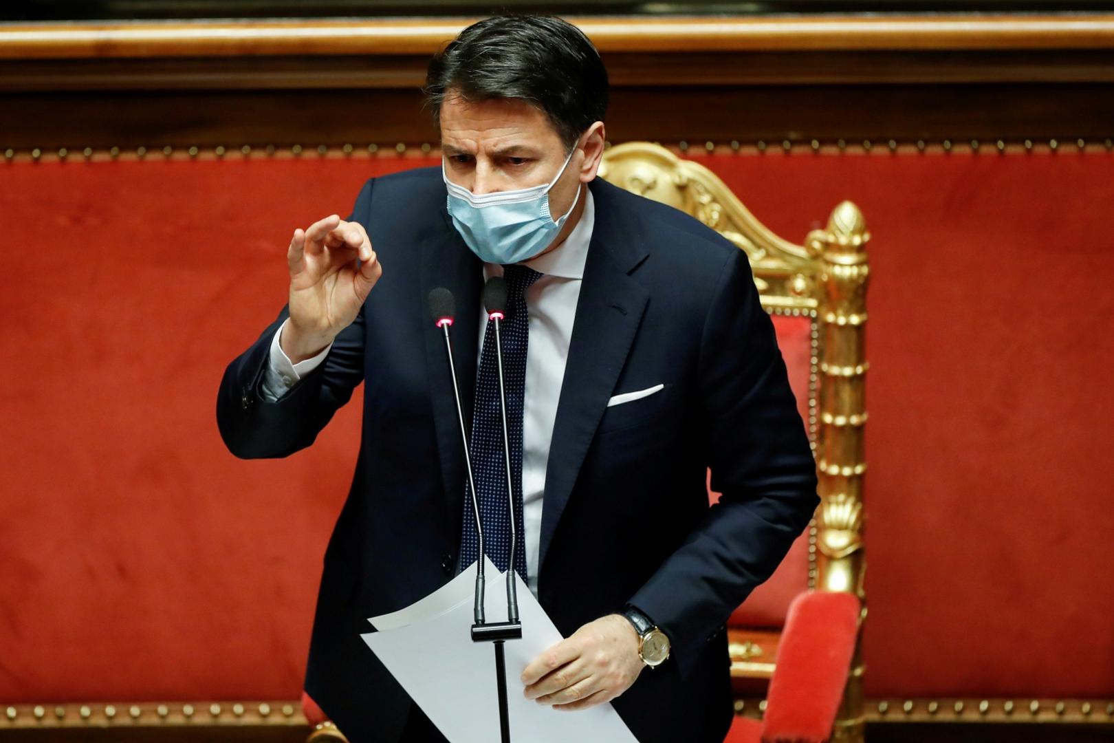 FILE PHOTO: Italian PM Conte faces a confidence vote at the upper house of parliament, in Rome FILE PHOTO: Italian Prime Minister Giuseppe Conte gestures as he speaks ahead of a confidence vote at the upper house of parliament after former Prime Minister Matteo Renzi pulled his party out of government, in Rome, Italy, January 19, 2021. REUTERS/Yara Nardi/File Photo YARA NARDI