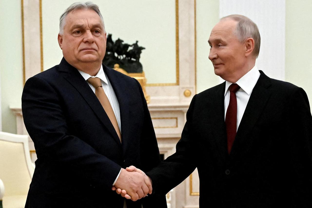 FILE PHOTO: Russian President Putin and Hungarian Prime Minister Orban meet in Moscow