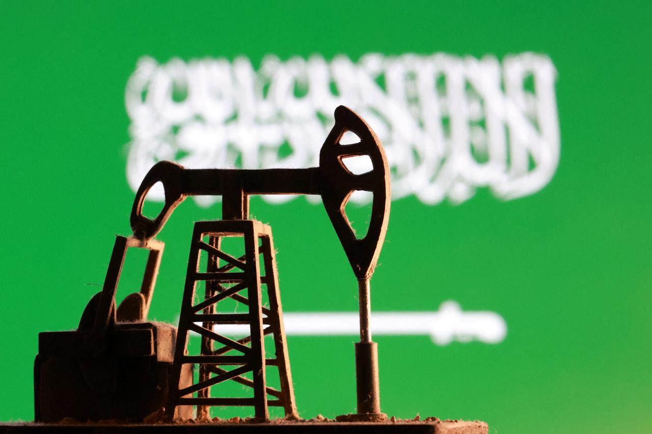 Illustration shows oil pump miniature model and Saudi Arabian flag