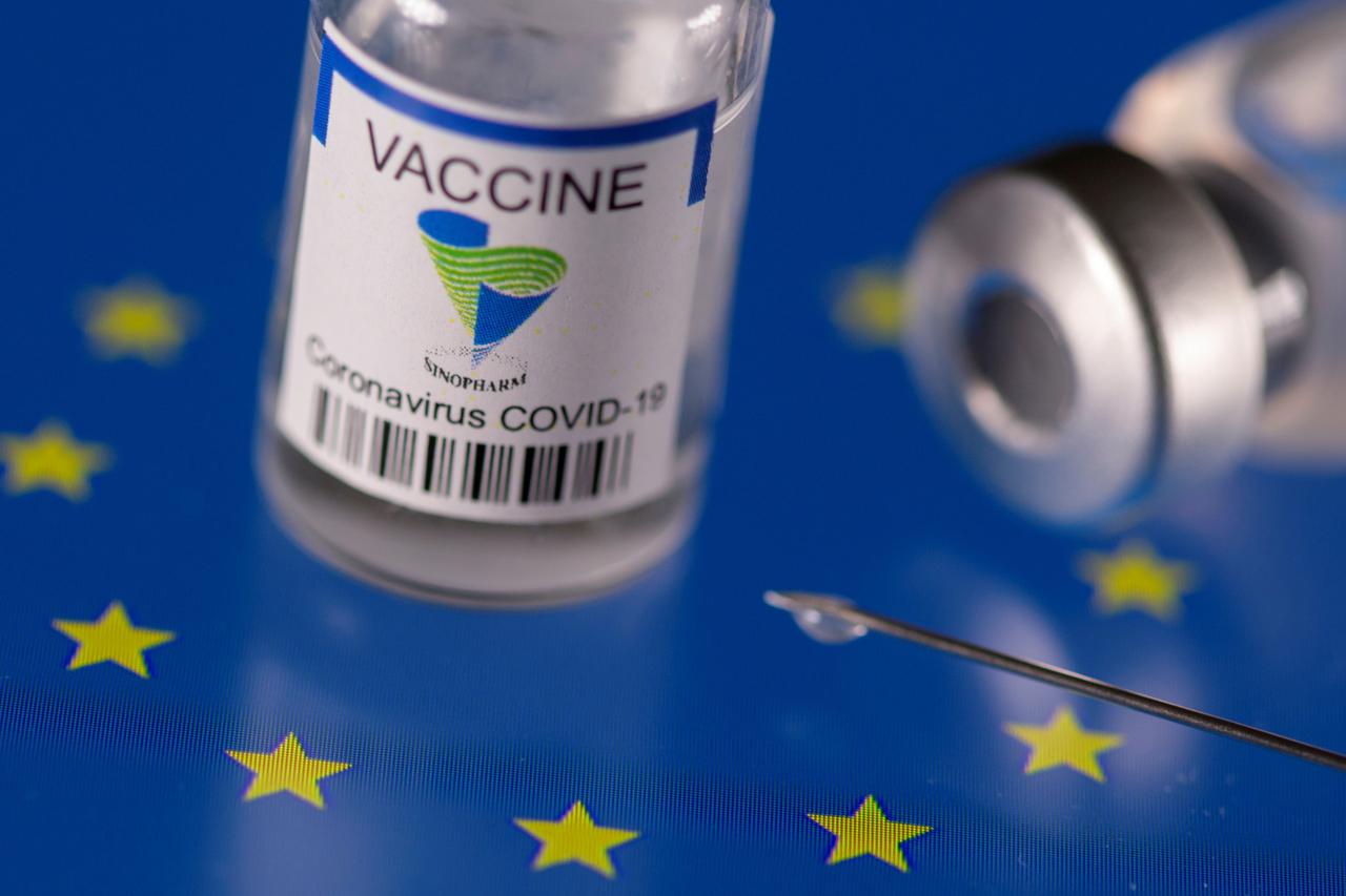FILE PHOTO: Vials labelled "Sinopharm coronavirus disease (COVID-19) vaccine" placed on displayed EU flag are seen in this illustration picture