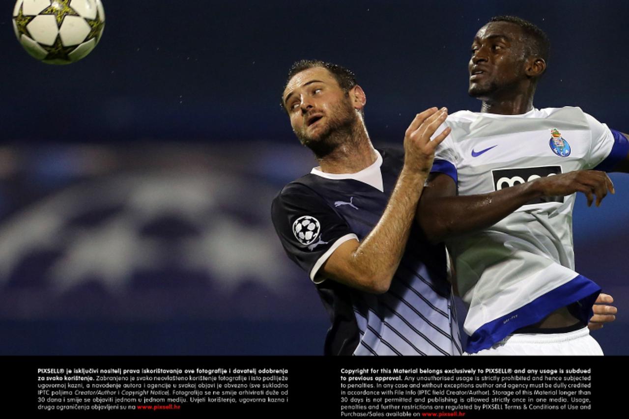 '18.09.2012., Zagreb, stadion u Maksimiru - Nogometna utakmica 1. kola UEFA Lige prvaka. GNK Dinamo - FC Porto. Josip Simunic, Jackson Martinez. Photo: Slavko Midzor/PIXSELL'