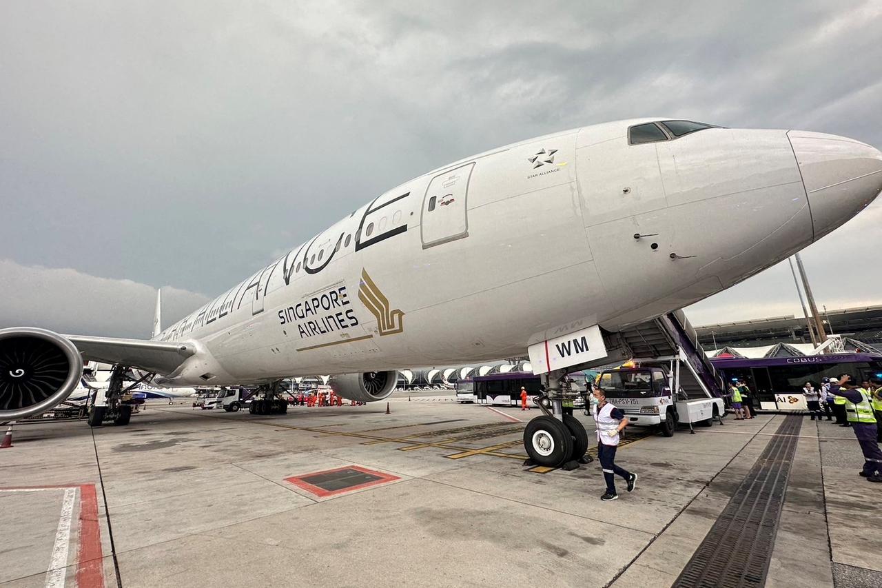 A Singapore airline aircraft is seen on tarmac after requesting an emergency landing at Bangkok's Suvarnabhumi International airport, Thailand