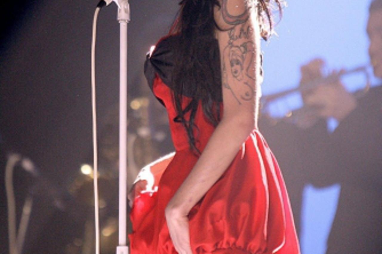 'File photo dated 14/02/07 of singer Amy Winehouse who has been found dead at her flat. Photo: Press Association/Pixsell'