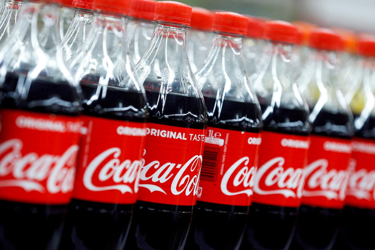 FILE PHOTO: Bottles of Coca-Cola are seen at a Carrefour Hypermarket store in Montreuil, near Paris