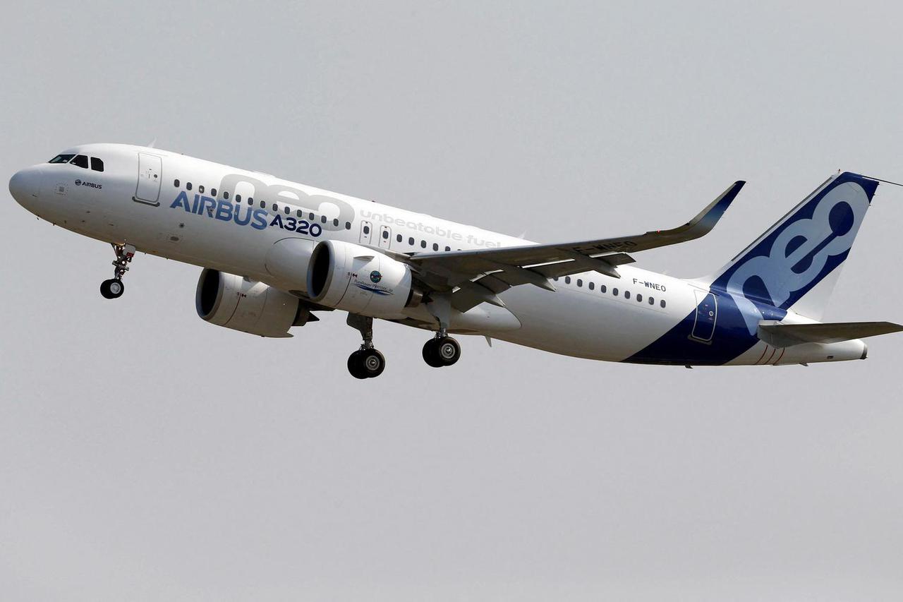FILE PHOTO: The Airbus A320neo takes off during its first flight event in Colomiers near Toulouse, southwestern France