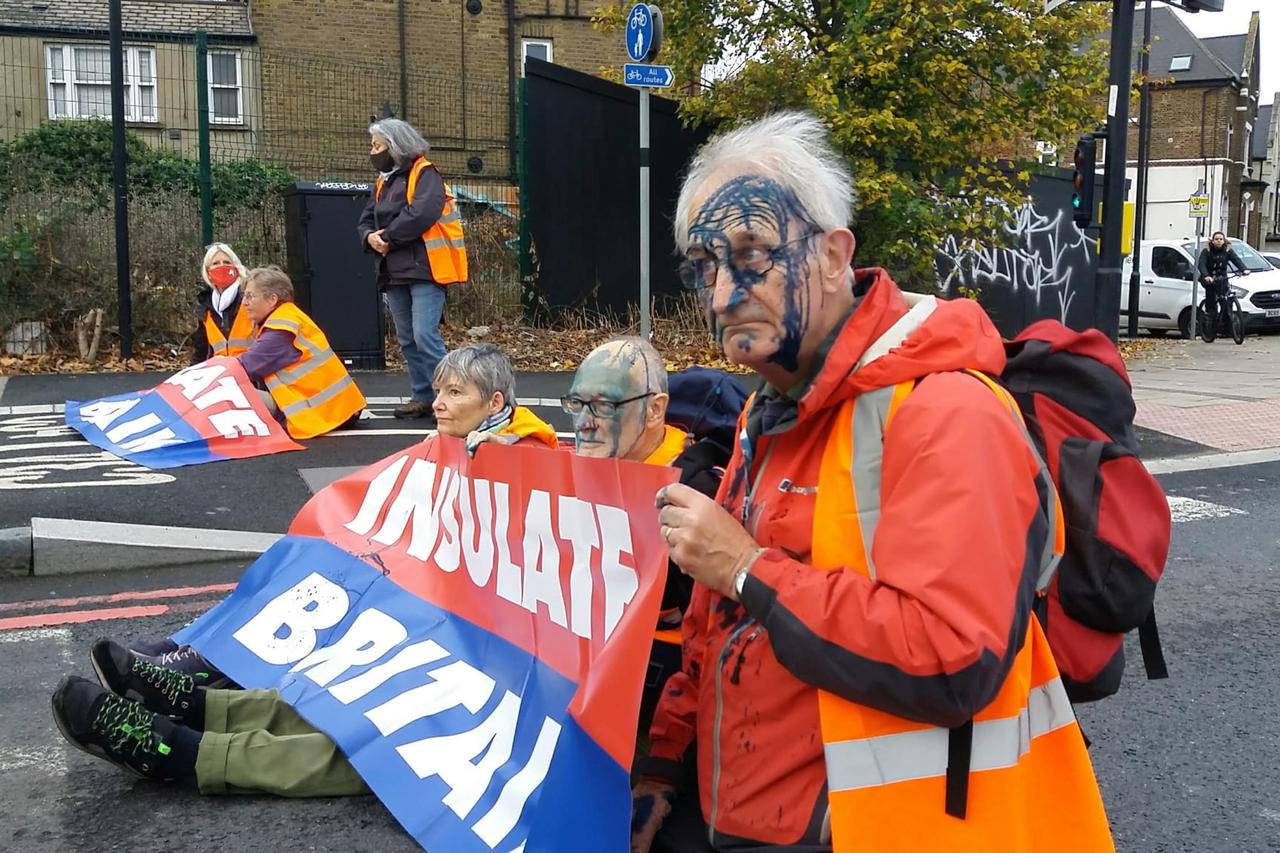 Climate change demonstrators block road in London