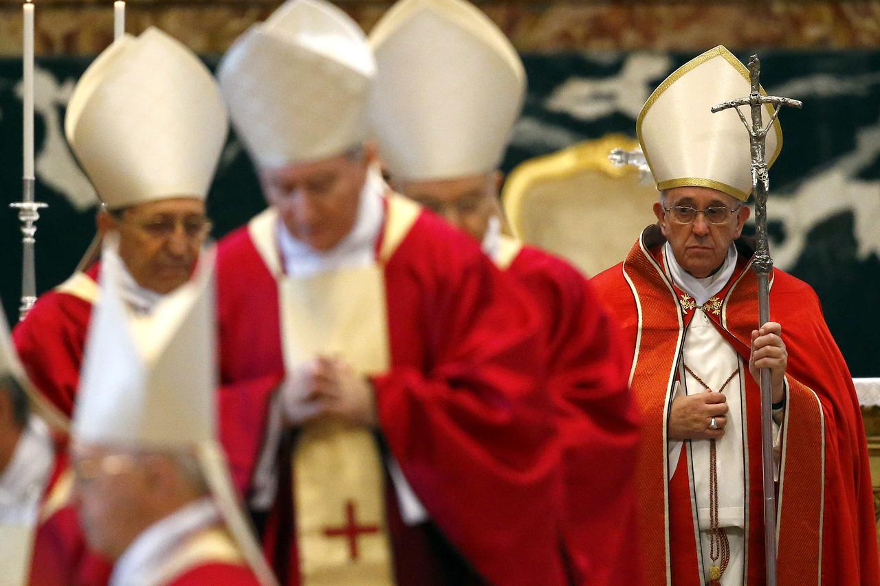 Pope Francis (R) attends during the funeral mass of late Cardinal Jorge Maria Mejia inside St.Peter's Basilica at the Vatican December 11, 2014.    REUTERS/Stefano Rellandini    (VATICAN  - Tags: RELIGION)