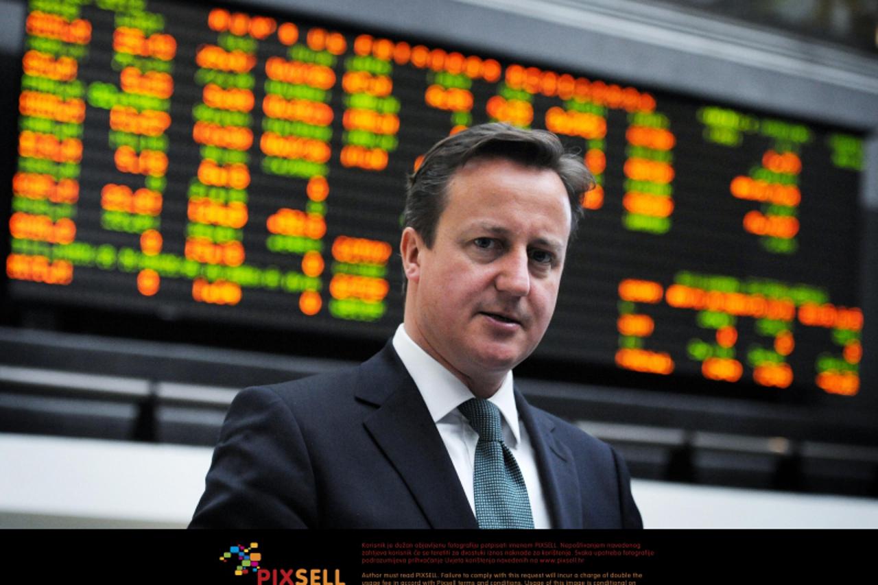 'Prime Minister David Cameron tours the Mexican Stock Exchange in Mexico City, during a two day visit to the capital where he will later hold talks with President Filipe Calderon. Photo: Press Associa
