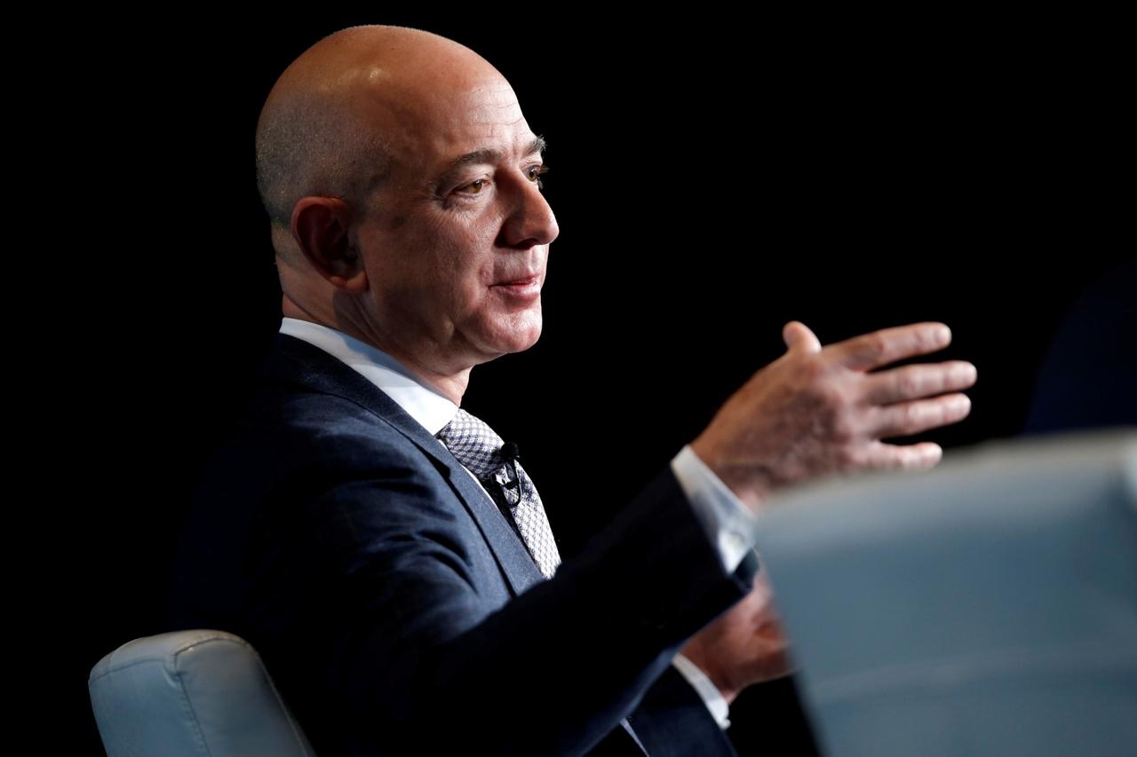 FILE PHOTO: Jeff Bezos, founder of Blue Origin and CEO of Amazon, speaks about the future plans of Blue Origin in Washington