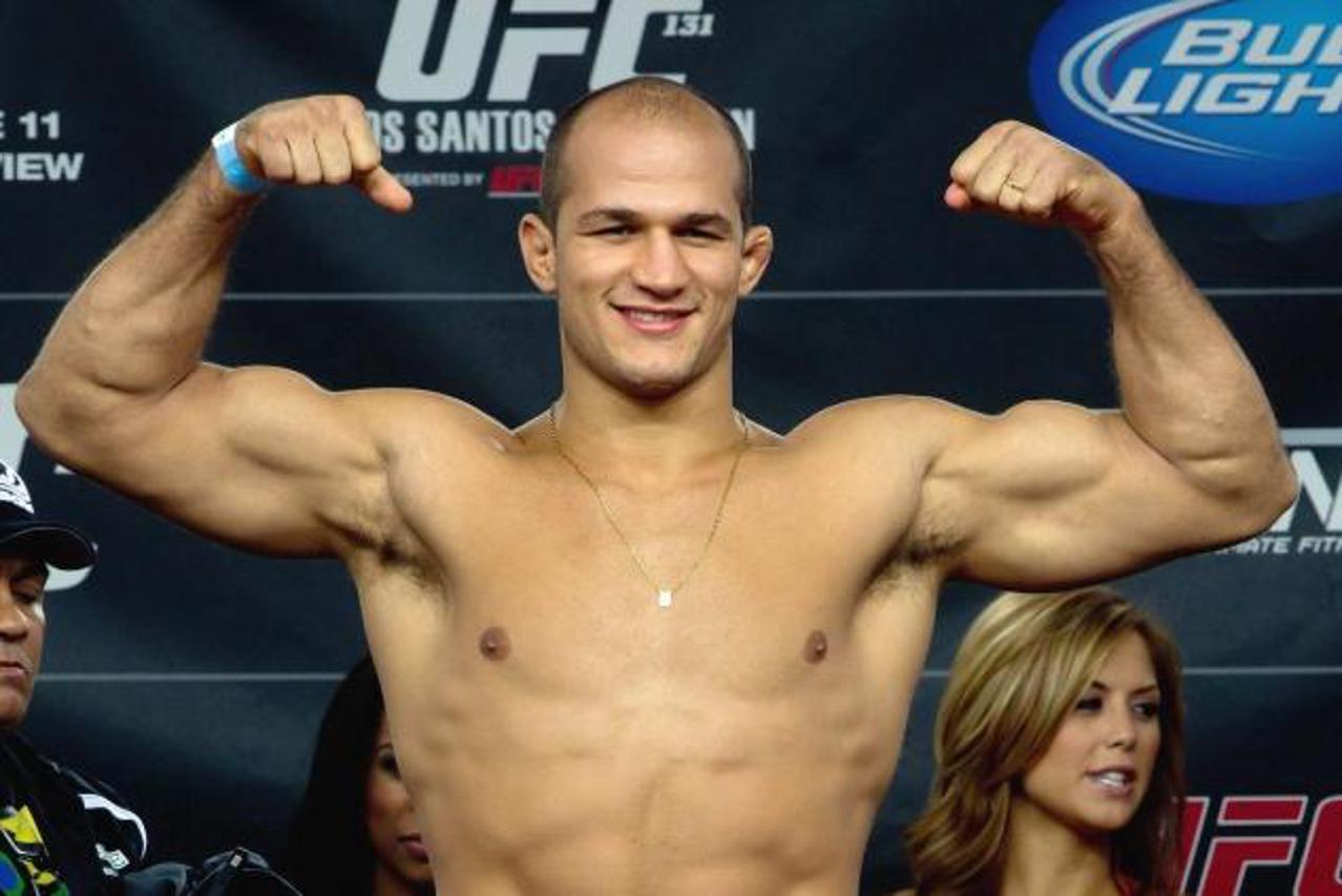 'Junior Dos Santos, of Brazil, poses during the weigh-in for UFC 131 in Vancouver, B.C., on Friday June 10, 2011. Dos Santos will fight Shane Carwin, of Denver, Colo., in the main event at UFC 131 Sat