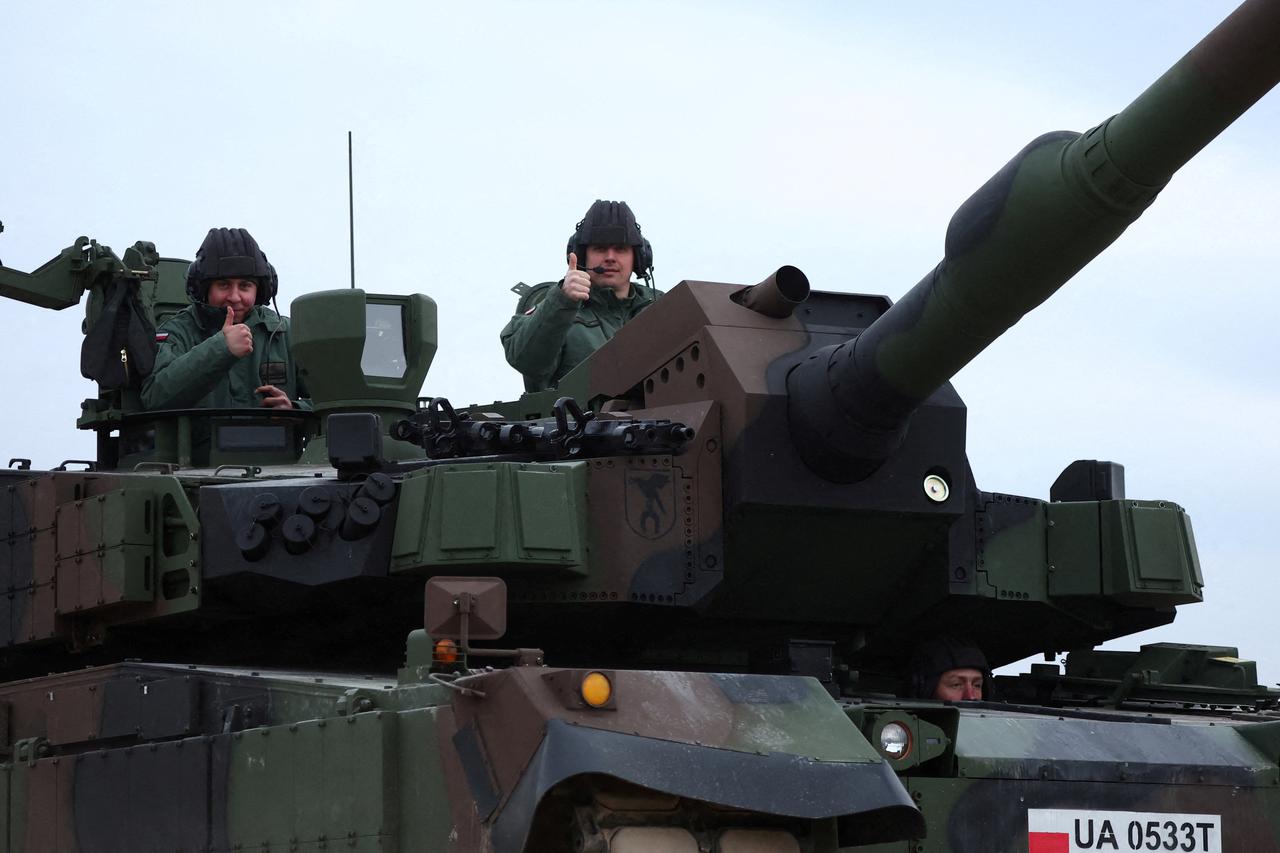 FILE PHOTO: Polish army trains with new tanks and howitzers from South Korea