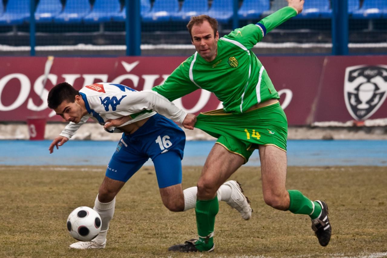 '05.03.2011., Osijek - 1. HNL, 20 kolo, NK Osijek - NK Istra 1961.,  Anton Maglica i Dalibor Pauletic Photo: Krunoslav Petric/PIXSELL'