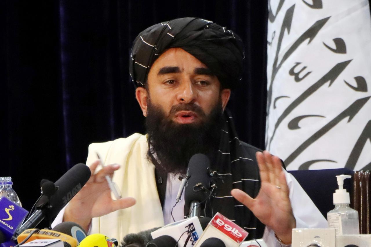 FILE PHOTO: Taliban spokesman Zabihullah Mujahid speaks during a news conference in Kabul