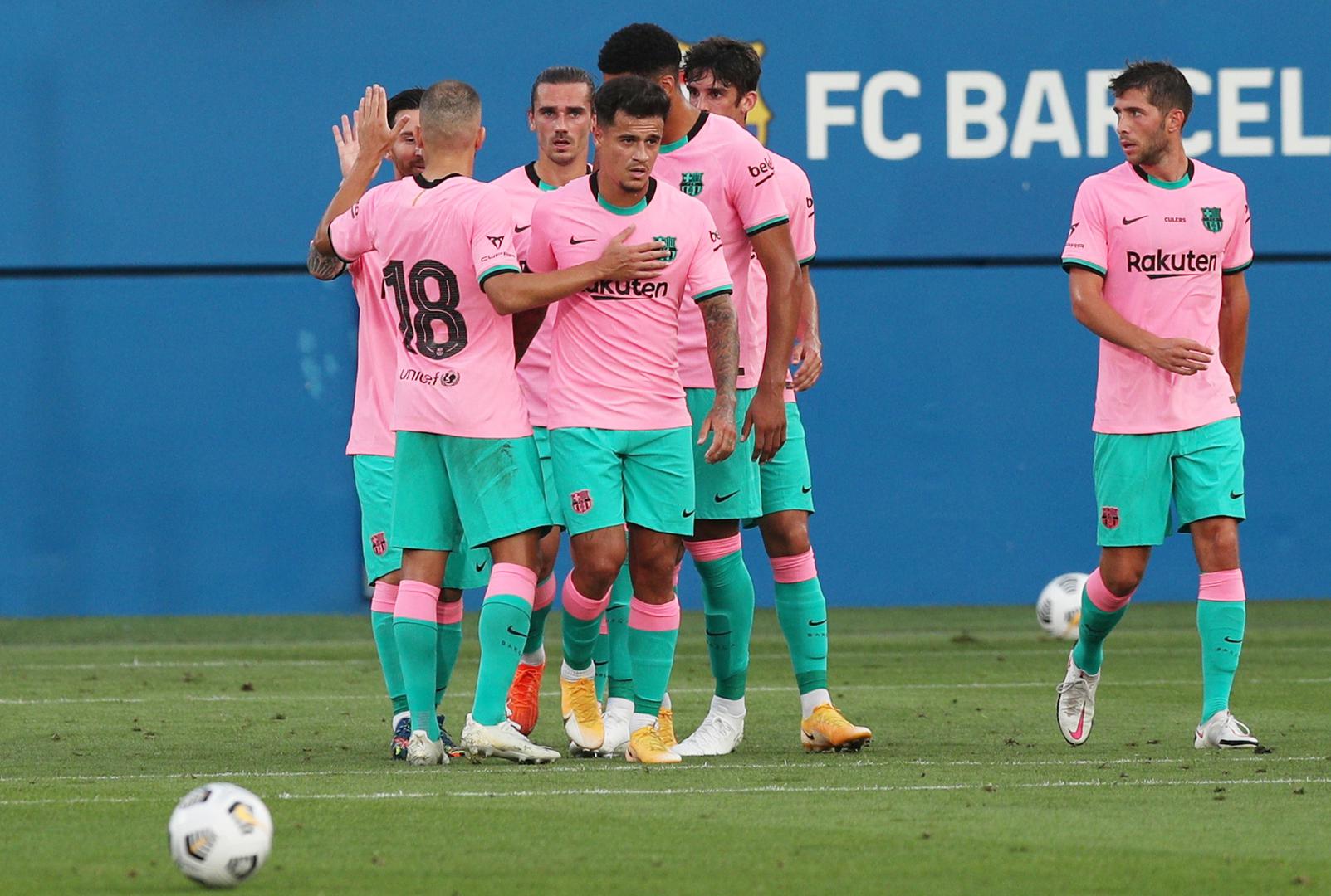 Pre Season Friendly - FC Barcelona v Girona Soccer Football - Pre Season Friendly - FC Barcelona v Girona - Johan Cruyff Stadium, Barcelona, Spain - September 16, 2020 Barcelona's Philippe Coutinho celebrates scoring their first goal with teammates REUTERS/Albert Gea ALBERT GEA
