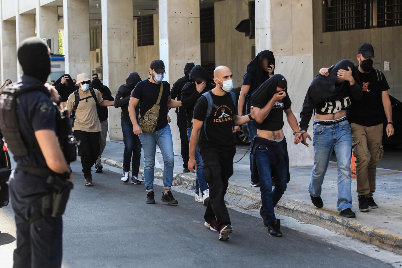 09.08.2023., Atena, Grcka - Svih 94 uhicenih osoba koje je grcka policija privela nakon navijackih nereda uoci utakmice 3. pretkola kvalifikacija Lige prvaka izmedju AEK-a i Dinama odvedeni su pred tuzitelja.  Photo: Yiannis Panagopoulos/EUROKINISSI/PIXSELL