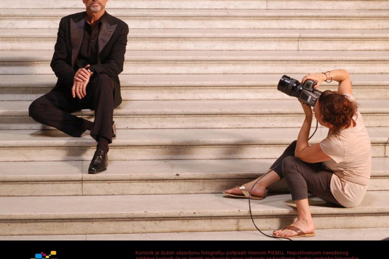 'EXCLUSIVE ALL-ROUND PICTURES    WORLD RIGHTS    British photographer Carolyn True takes pictures of George Michael on the steps of the Opera Garnier in order to promote the final date of his European