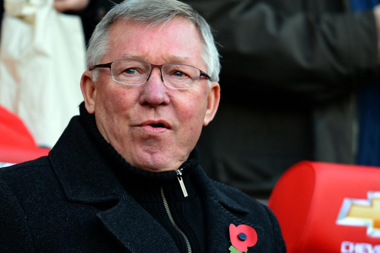 'Manchester United manager Alex Ferguson arrives for the English Premier League football match between Manchester United and Arsenal at Old Trafford in Manchester, northwest England, on November 3, 20