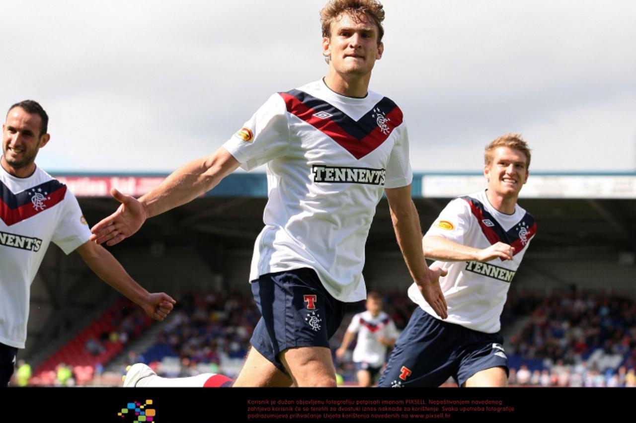 'Ranger\'s Nikica Jelavic celebrates scoring a penalty during the Clydesdale Bank Scottish Premier League match at Tulloch Caledonian Stadium, Inverness. Photo: Press Association/Pixsell'