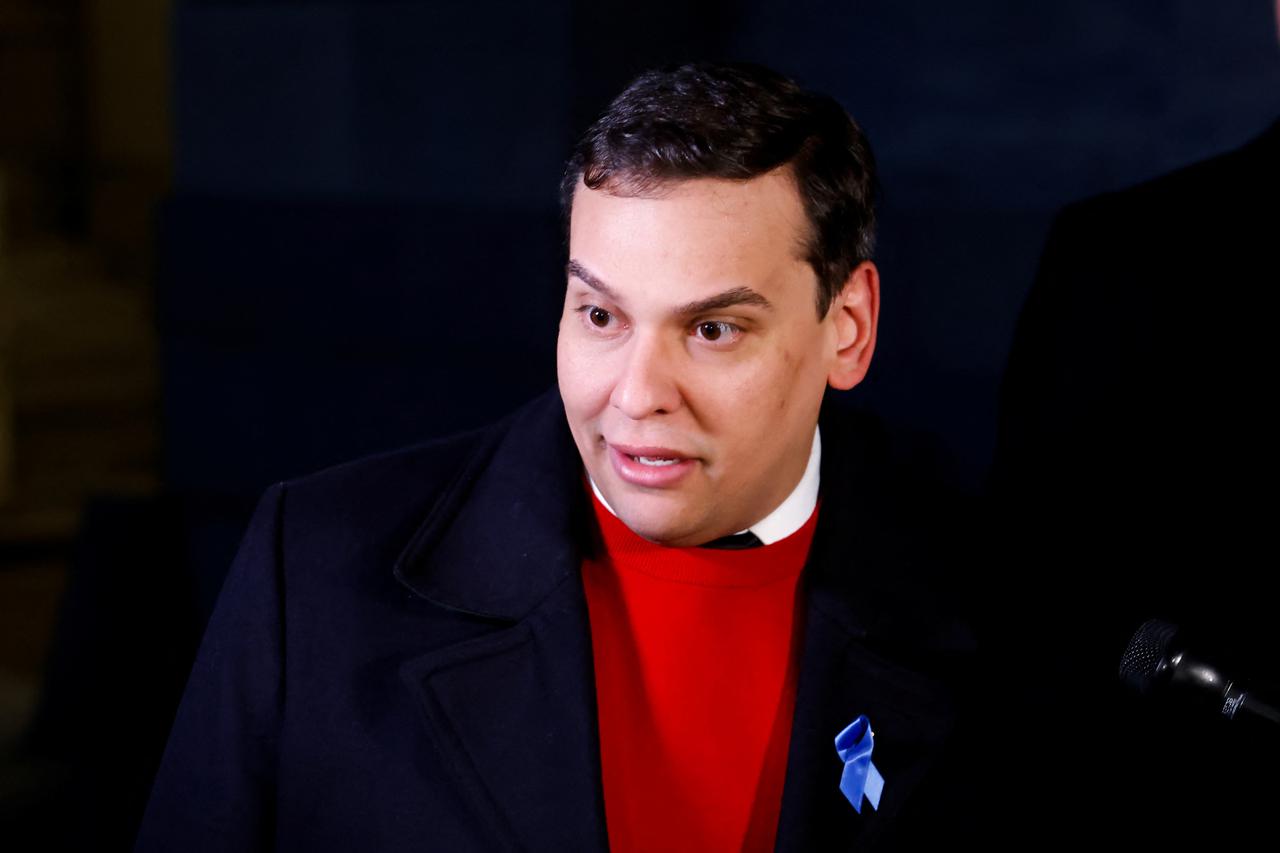 U.S. Rep. George Santos heads to attend a vote on whether the House of Representatives will expel him on Capitol Hill in Washington